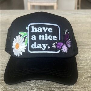 Women’s Black with Purple Butterfly /Daisy custom patch adjustable trucker hat